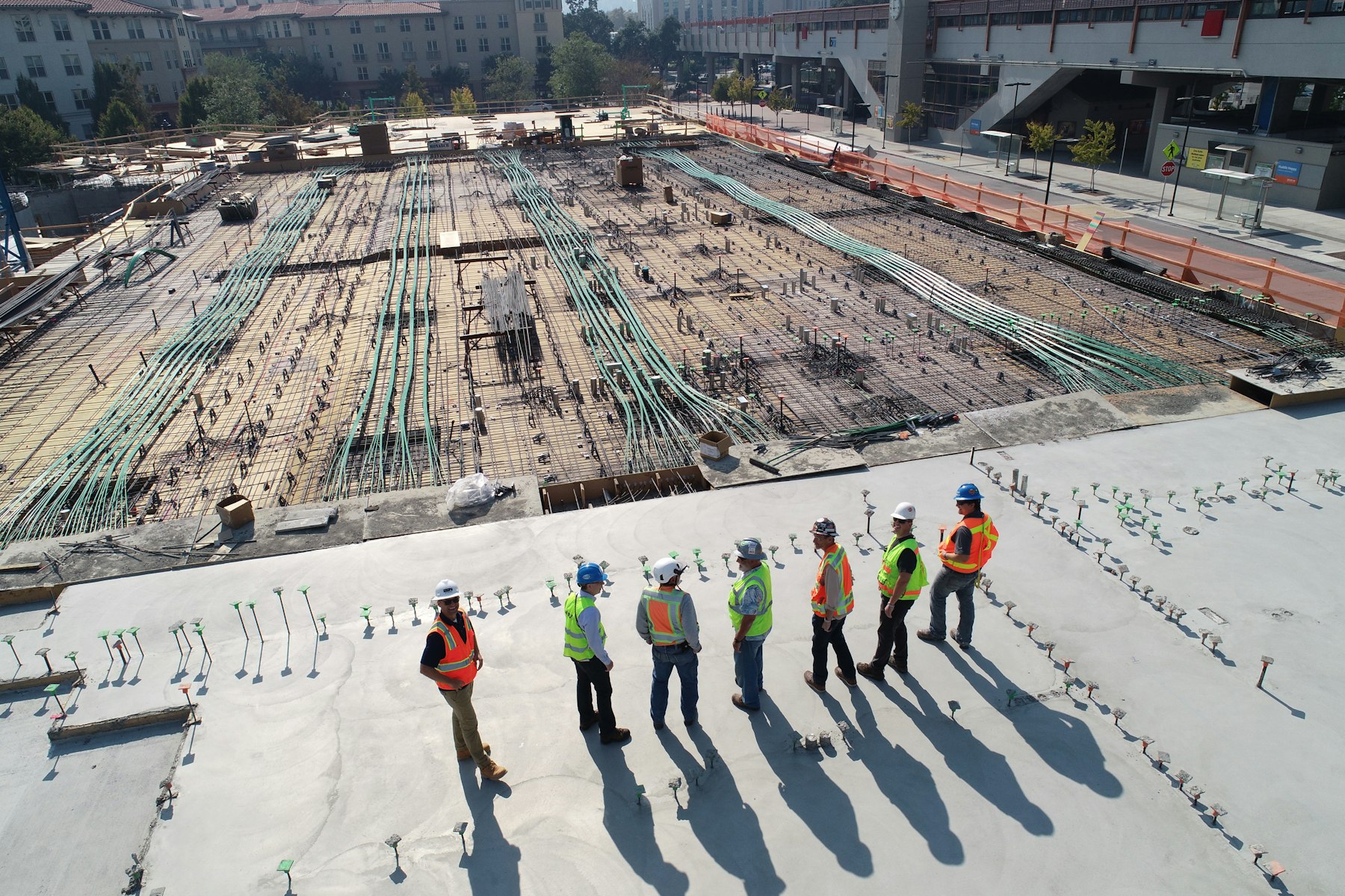 Construction professionals on an active commercial jobsite